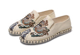 Zapatos de lona transpirables con bordado y suela de tela resistente para hombre